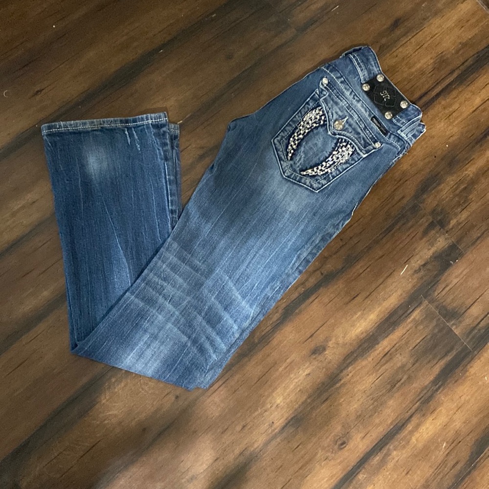 Gently worn Miss Me boot cut jeans.  Size 29, Inseam 32